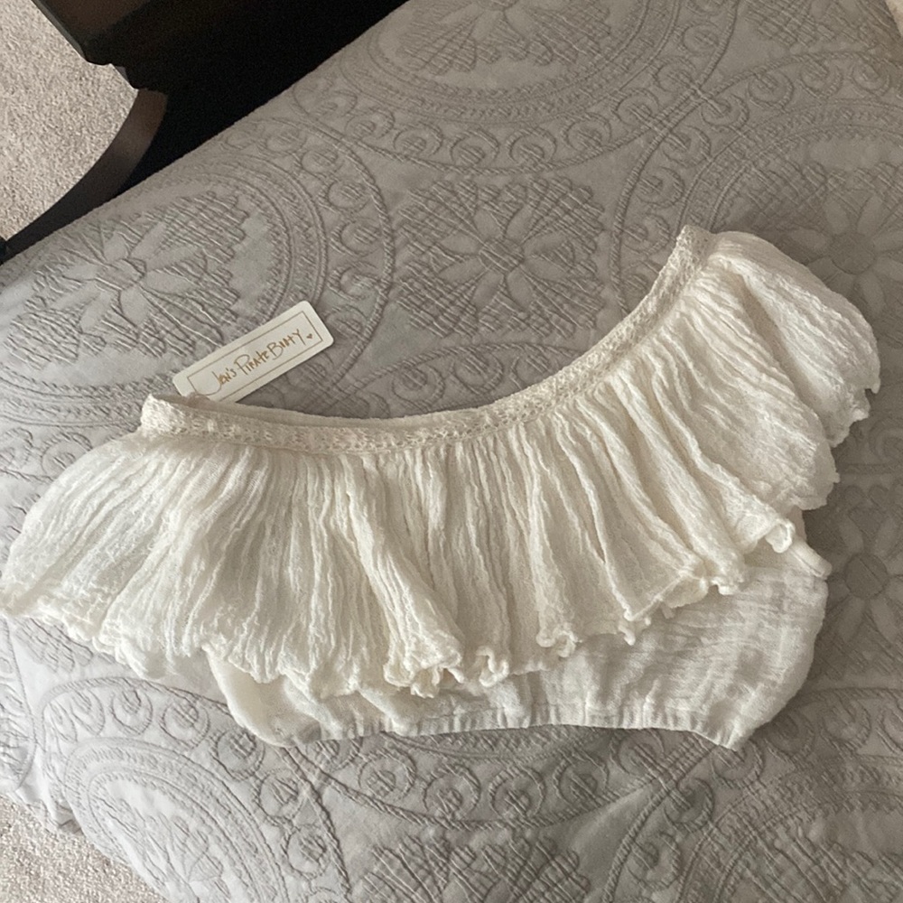 Free People, Jen’s Pirate Booty. Cream size L one should crop top.